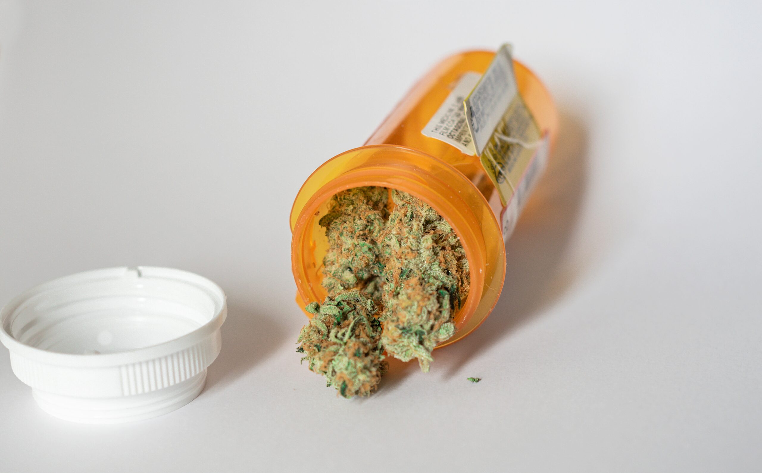 medical-marijuana-close-up-spilling-out-of-a-presc-2022-11-14-06-39-21-utc