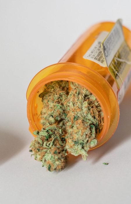 medical-marijuana-close-up-spilling-out-of-a-presc-2022-11-14-06-39-21-utc